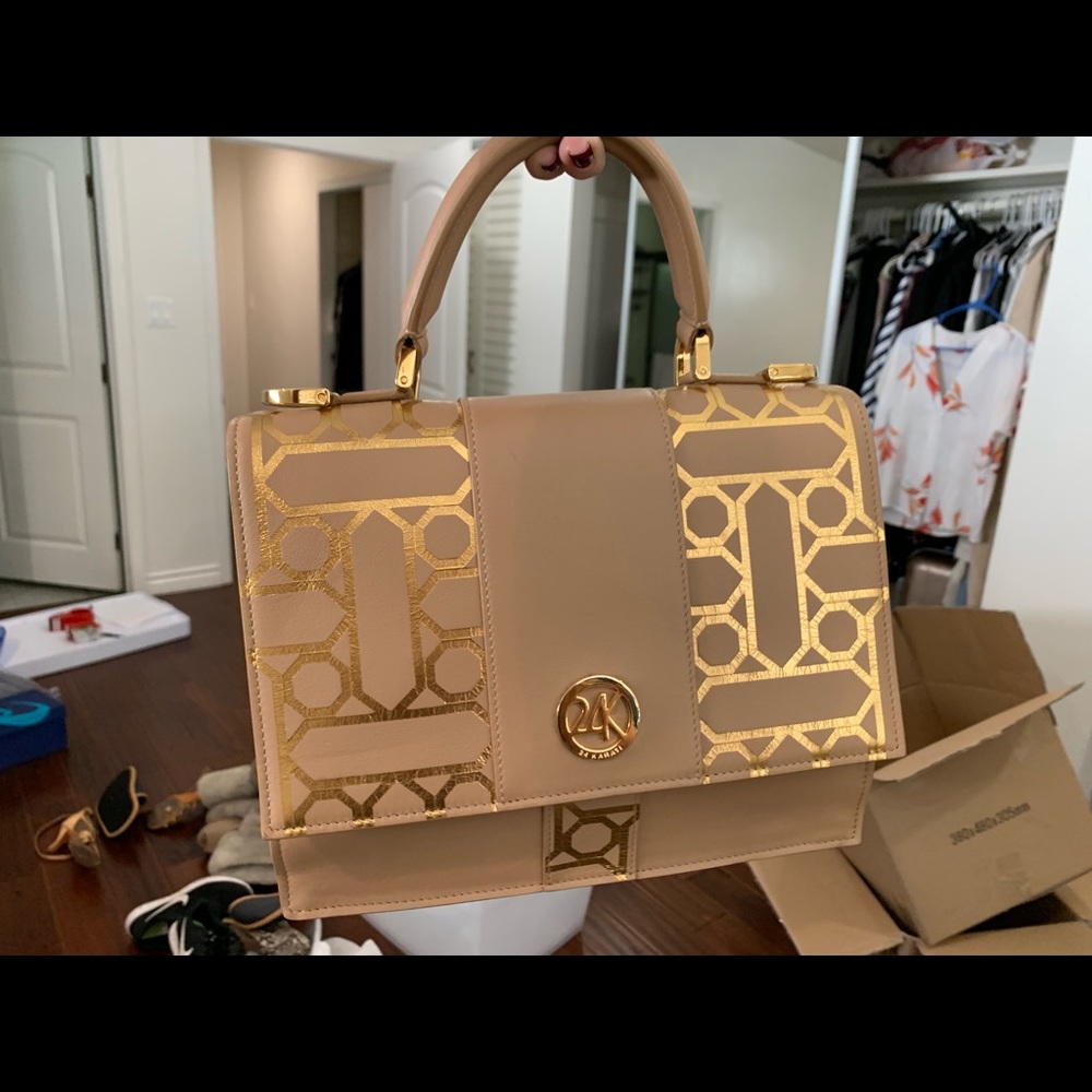 Amazing brand new 24k hand bag!!